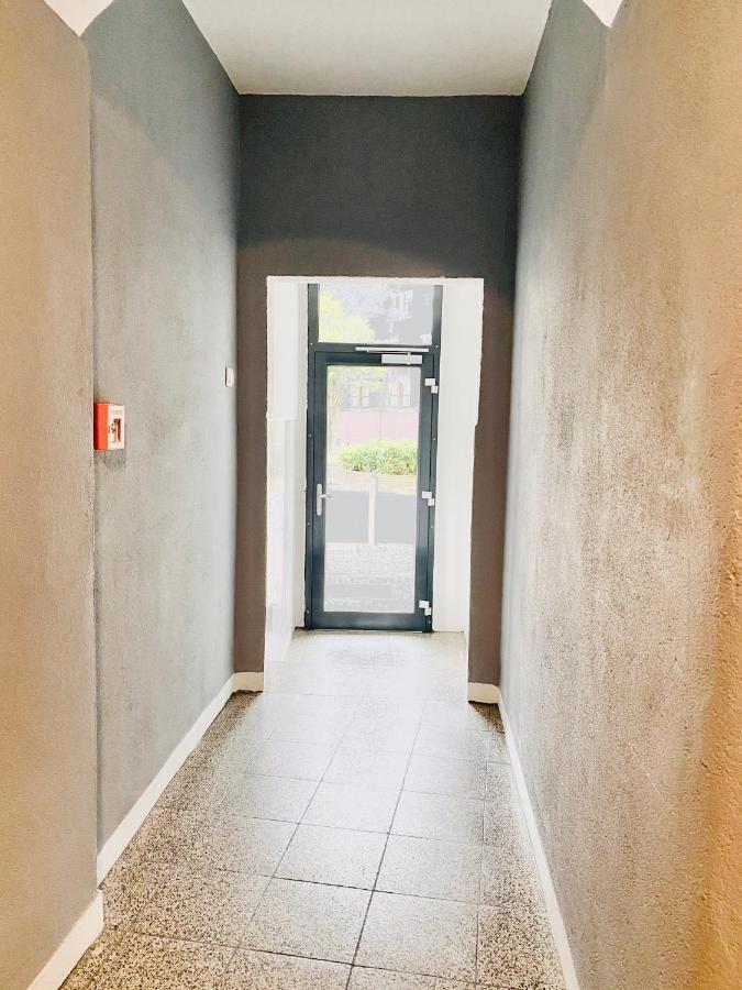 Tm Aparts Dortmund Exterior photo Entrance to the house