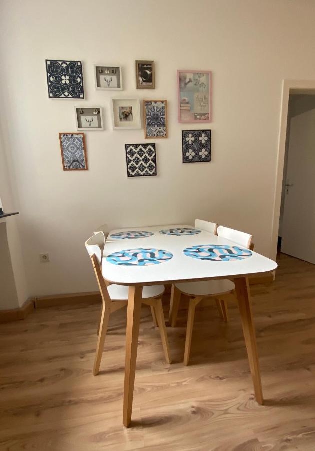 Tm Aparts Dortmund Exterior photo A dining room table with placemats