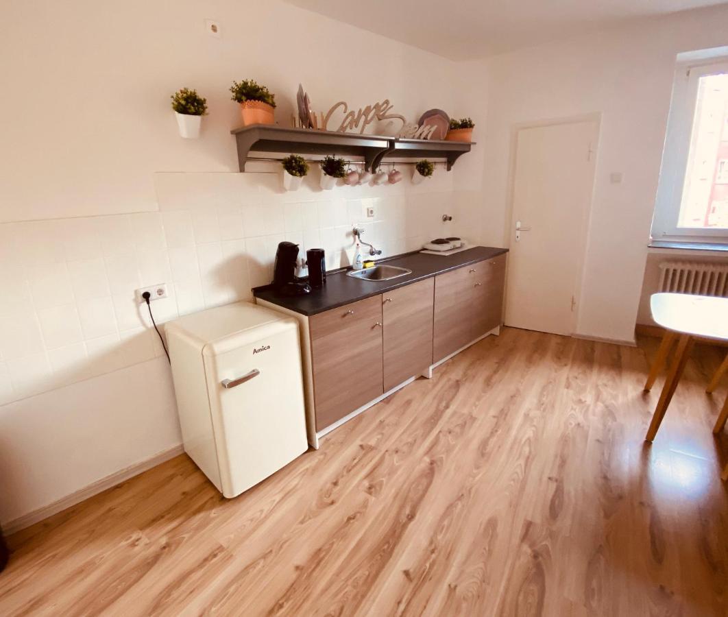 Tm Aparts Dortmund Exterior photo A typical kitchen in a student apartment